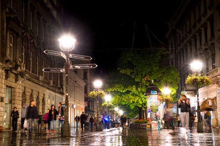 BELGRADE, SERBIA - SEPTEMBER 25: Rainy inght at Knez Mihailova Street on September 25, 2015 in Belgrade, Serbia. Street is the main shopping mile of Belgradeのeditorial素材