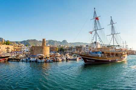 Kyrenia Girne, CYPRUS - JULY 5: Frigate in Kyrenia harbour on July 5, 2015. Kyrenia harbor is currently a famous tourist resort.のeditorial素材