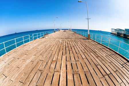 Wooden pier at Limassol's seafront promenade. Cyprus.の写真素材