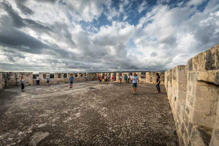 LIMASSOL, CYPRUS - October 25, 2016: Tourists admiring the surroundings from the roof of Kolossi castle. Limassol District, Cyprusのeditorial素材