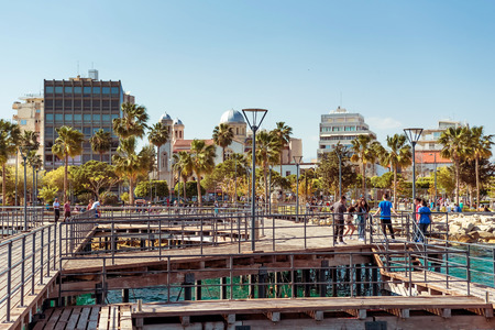 LIMASSOL, CYPRUS - APRIL 01, 2016: Limassol Cityscape and Seaside Park, view from wooden pier.のeditorial素材