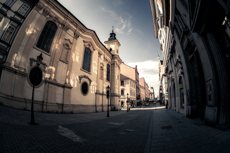 Scenic narrow cobbled street with historic buildings in an old town of Pilsen (Plzen). Czech Republic.のeditorial素材