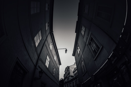 Stare Mesto, view of Husova street with Hanging man above the head. Prague's Old Town, Czech Republicの写真素材