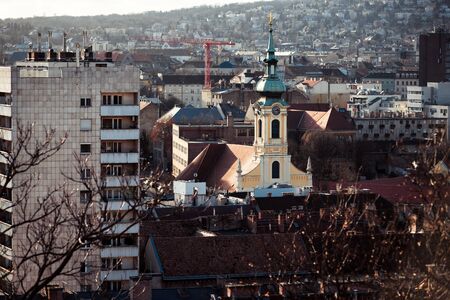 Our Lady of the Snows Parish Church formerly called as the Blood Chapel and Buda cityscape....