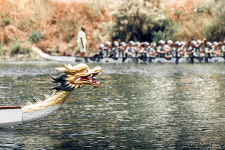 Close-up of a Dragon Boat head during Traditional Dragon Boat Racingsの写真素材