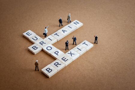Miniature people and Brexit crossword puzzle