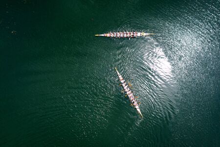 Two teams competing in a Dragon Boat Races