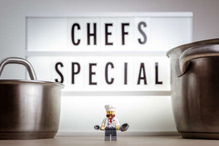 Cheerful miniature chef. Chef's special concept. Illustrative editorial. September 02, 2021のeditorial素材