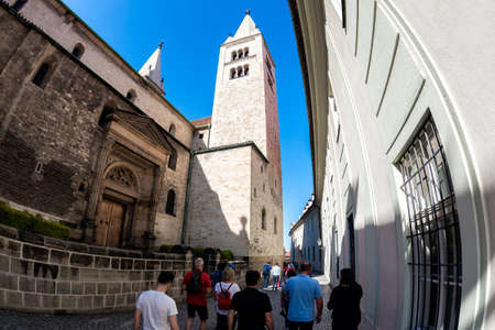Prague, Czech Republic - May 25, 2017: Group of tourists at the eastern side of St. George's Basilica. Prague Castle, Czech Republicのeditorial素材