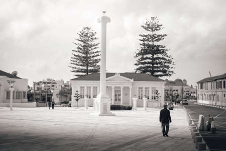 Paphos, Cyprus - April 08, 2018: Building Pafos Municipal Library and some people walking around at Paphos Municipal Parkのeditorial素材