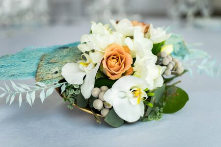 Beautiful wedding bouquet is on the table