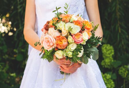 Bride showing off her beautiful bouquet of flowers