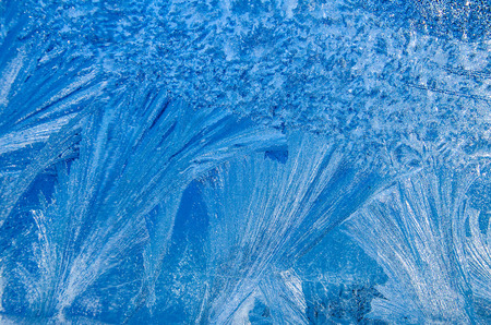 ice shiny and bright frosty patterns on the window