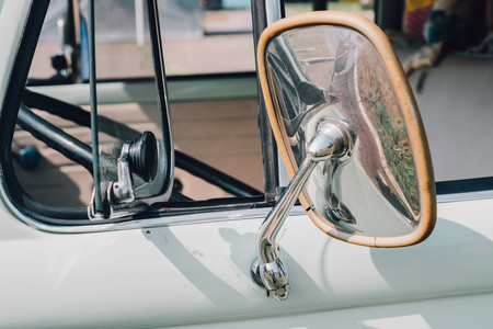 vintage auto body, the chrome parts of the car body, vintage cars. unfocuset and FILM effectの写真素材