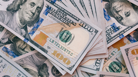 texture of one hundred dollar bills. Counting New Dollar Bills
