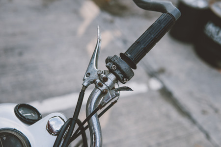 chrome-plated vintage motorcycle standing at the show . motorcycle culture and speed. Separate details of a collection motorcycle of silver color close-upの写真素材