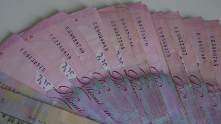 Banknotes of Ukrainian hryvnia on white background  close-up.