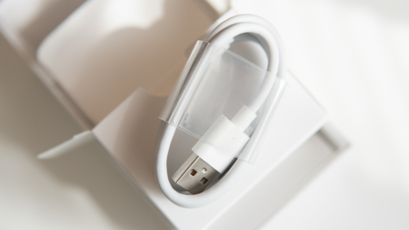 white charging cable close-upの写真素材