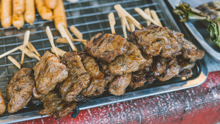 meat kebabs on the Thai market close-up.