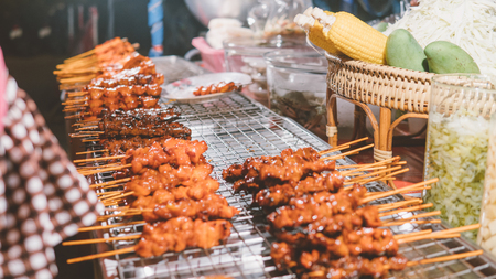 meat kebabs on the Thai market close-up.の写真素材