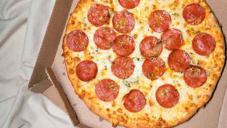 pizza, fast food, food of a modern person. Pizza order for a partyの写真素材