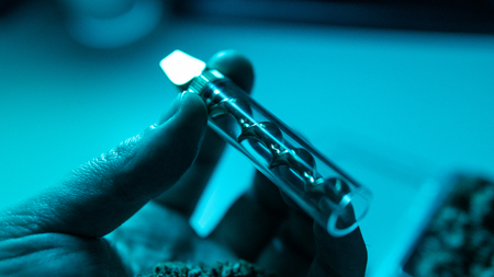 smoking accessories for marijuana close-up. Glass blunt for smoking cannabisの写真素材