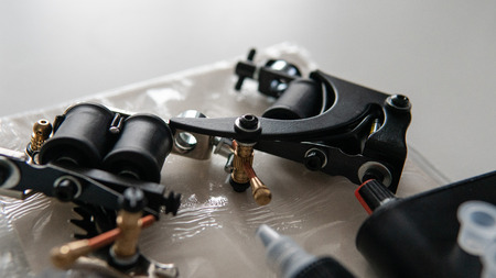 tattoo set for working in close-up. Special tattoo machine for artistの写真素材