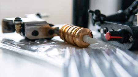 tattoo set for working in close-up. Special tattoo machine for artistの写真素材