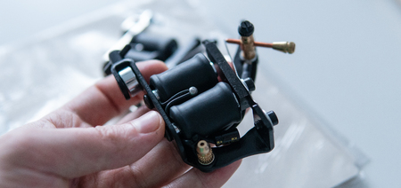 tattoo set for working in close-up. Special tattoo machine for artist