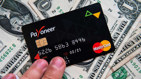 Aschheim, Germany -27 June  2020 : Blocking Payoneer cards, Wirecar company bankruptcy. Issuing Cards from Wirecard Card Solutionsのeditorial素材