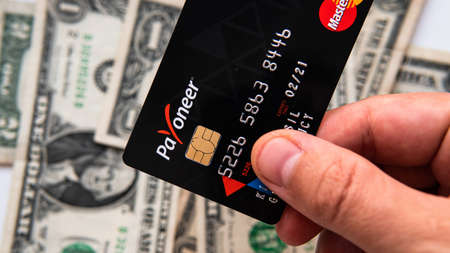 Aschheim, Germany -27 June  2020 : Blocking Payoneer cards, Wirecar company bankruptcy. Issuing Cards from Wirecard Card Solutionsのeditorial素材