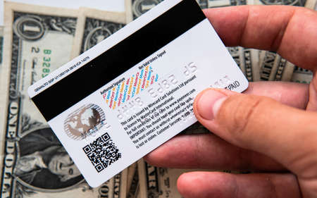 Aschheim, Germany -27 June  2020 : Blocking Payoneer cards, Wirecar company bankruptcy. Issuing Cards from Wirecard Card Solutionsのeditorial素材