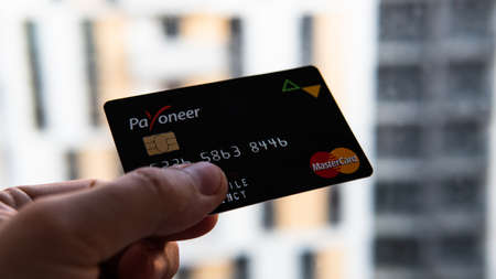 Aschheim, Germany -27 June  2020 : Blocking Payoneer cards, Wirecar company bankruptcy. Issuing Cards from Wirecard Card Solutionsのeditorial素材
