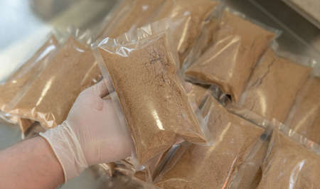 production of food additives from mushrooms. Healthy mushroom dietary supplements packaged in plastic bags. Mycelial dietary supplementsの写真素材