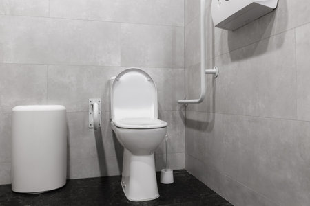 Modern handicapped bathroom for the elderly and disabled, with grab bars and wheelchair access. High quality photo. High quality photoの写真素材