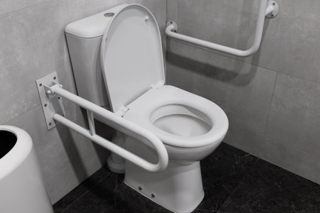 Modern handicapped bathroom for the elderly and disabled, with grab bars and wheelchair access. High quality photo. High quality photoの写真素材