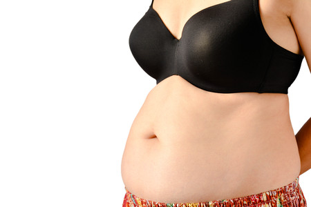 Belly of woman on white background isolateの写真素材