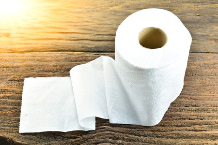 White tissue paper put on the old bark, wood under the sunlightの写真素材