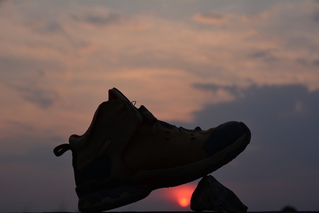 sport footwear and silhouette style under the skyの写真素材