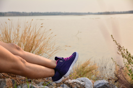 Closeup legs skin on road and under the sky for health care conceptの写真素材