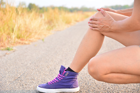 Closeup legs skin on road and under the sky for health care conceptの写真素材
