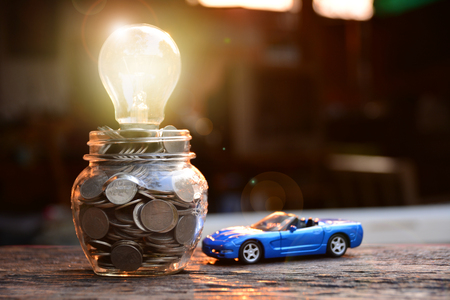 Business concept car insurance or sell and  buy car, car financing. Light of bulb for ideas.の写真素材