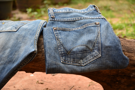 Denim jeans texture, Denim jeans with wood on nature background の写真素材