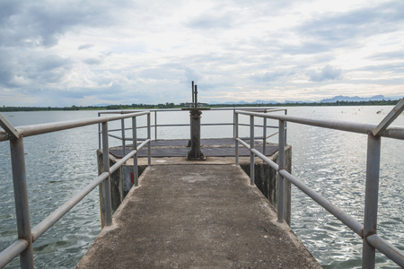 The floodgates on a dam in a river from in Thailand. Floodgate construction.の写真素材