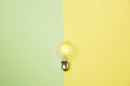Top view of light bulb on colorful background and copy space for insert text.の写真素材