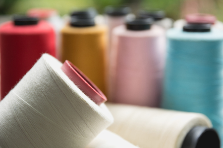 Colorful sewing threads, Colored thread coils.