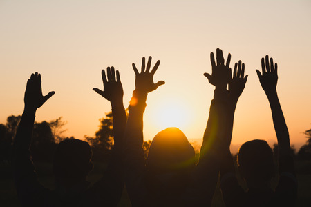 Hand of people arm raising up showing power strong with sky background.の写真素材