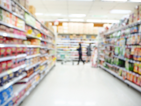 Abstract blurred of people walking in the supermarket background.
