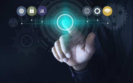 Hand click on virtual touchscreen button. Hand pressing modern buttons. Man hands pressing virtual screens technology concept.の写真素材