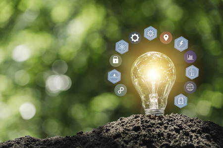 Light bulbs with glowing one. technology and creativity concept with light bulbs and copy space for insert textの写真素材